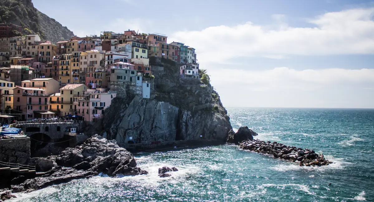 Manarola village perched on cliffs above the sea in Cinque Terre
